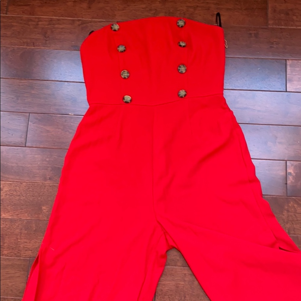 Red romper with slit